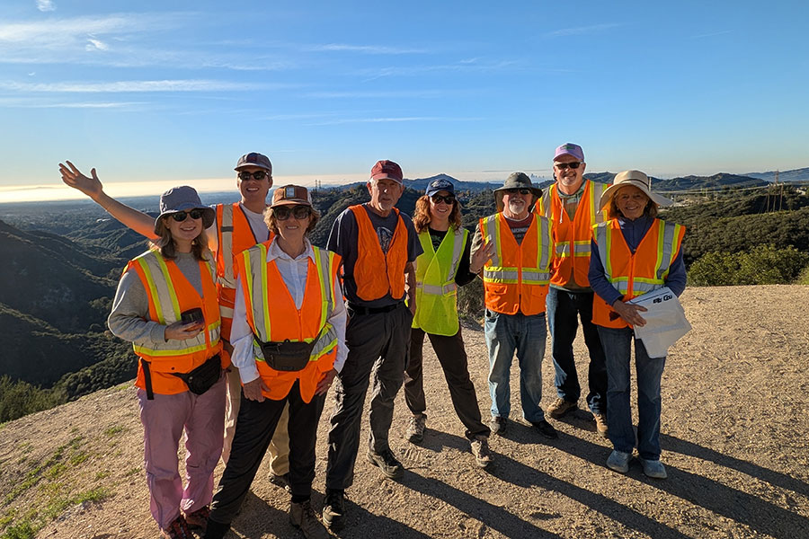 group of Takataka club volunteers in safety vests